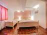Zimmer U kachničky (Nr. 4) - rosa Zimmer mit vier Betten